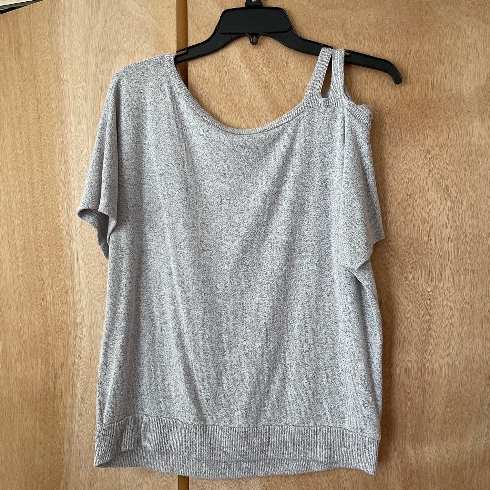Size medium Aeropostale top with strappy left shoulder sleeve.